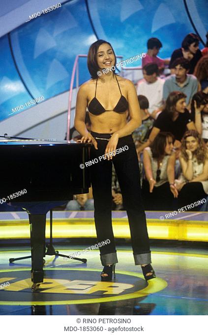 Italian showgirl and actress Ambra Angiolini at Superclassifica Show studios. Italy, 1996