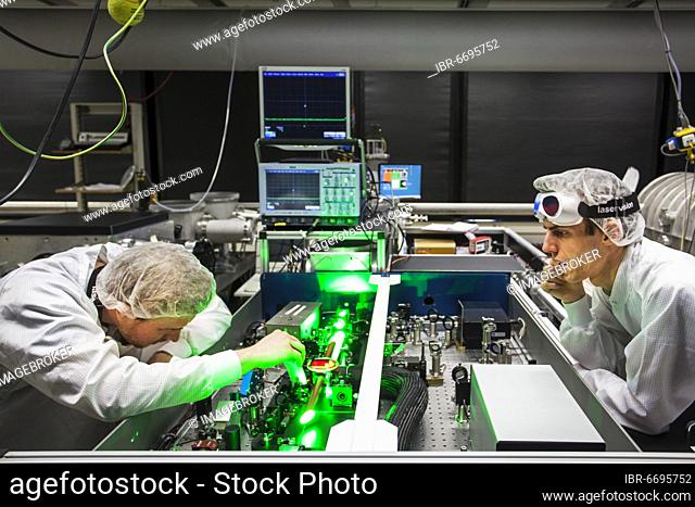 PhD student during his research work adjusting his experimental setup, laser laboratory of Prof. Georg Pretzler's working group for laser and plasma physics at...