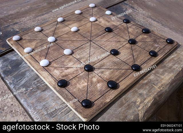 Alquerque, also known as Qirkat. Strategy board game originated in the Middle East