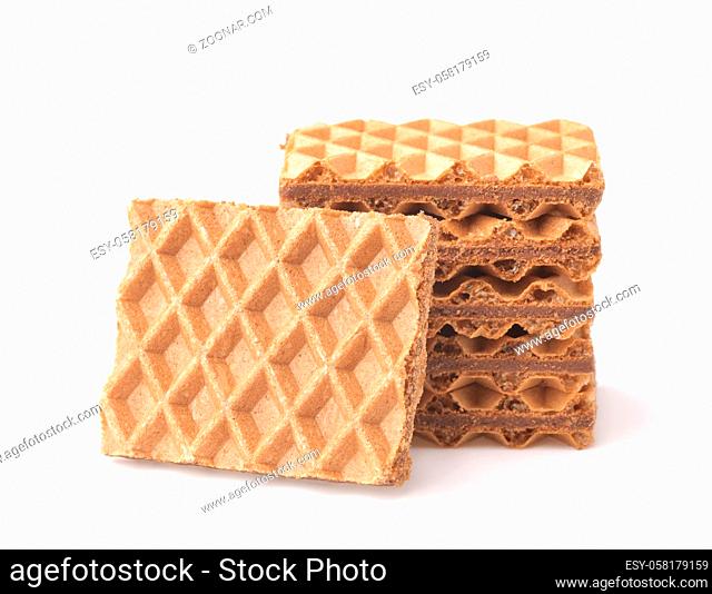 Stack of chocolate stuffed wafers isolated on white