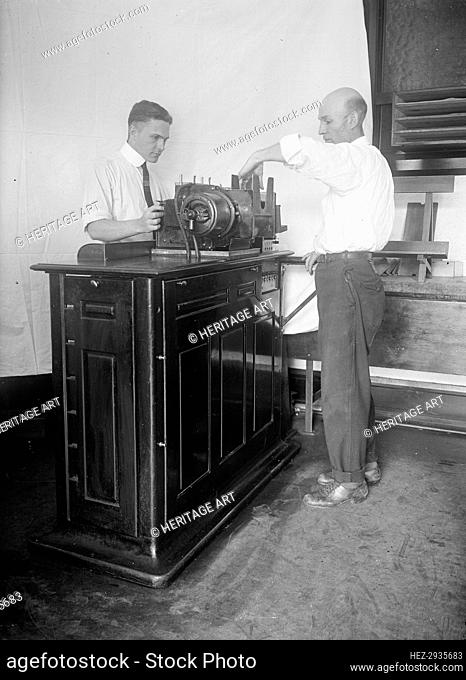 Census Bureau, Department of Commerce - Tabulating Machine, 1917. Creator: Harris & Ewing