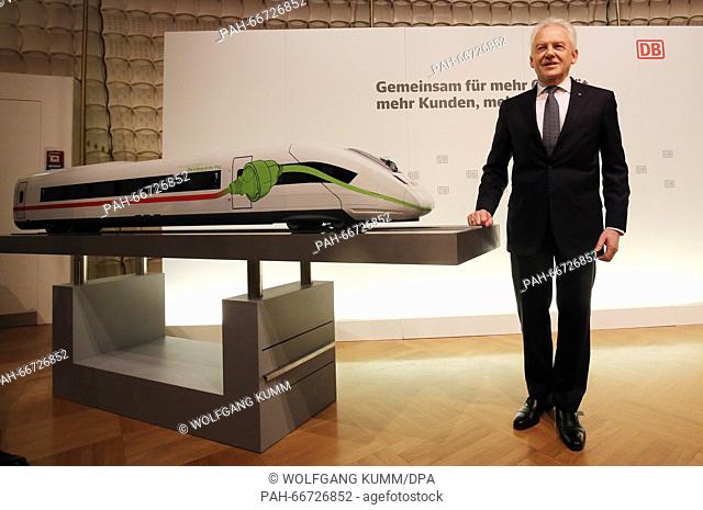 Deutsche Bahn CEO Ruediger Grube poses next to a model of an InterCityExpress (ICE) train prior to the financial statement press conference of the German...