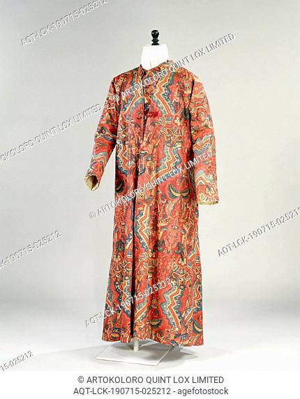 Cambay (Banyan) Quilted dressing gown of cotton, stained and painted with multicolored floral motifs and zigzag lines on red ground, lined with striped silk