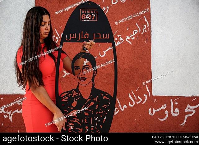 25 July 2023, Lebanon, Beirut: A picture provided on 28 July 2023 shows Maria Fares, sister of firefighter Sahar who was killed in the 4 August 2020 massive...