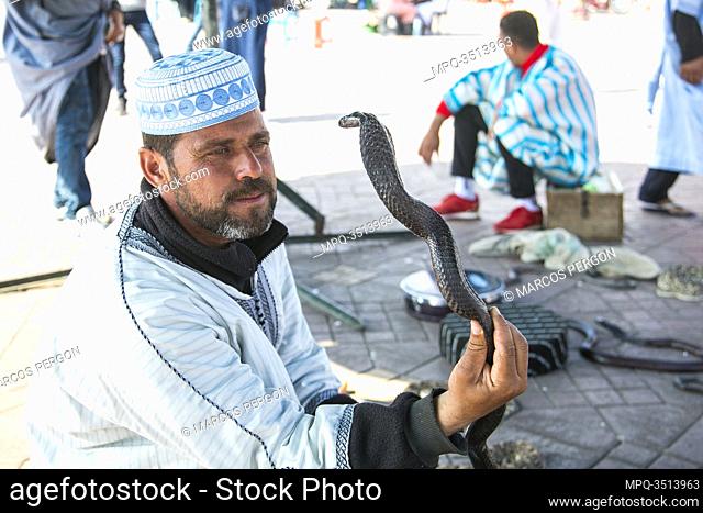 Snake charmer in Jemaa el-Fna square marrakesh