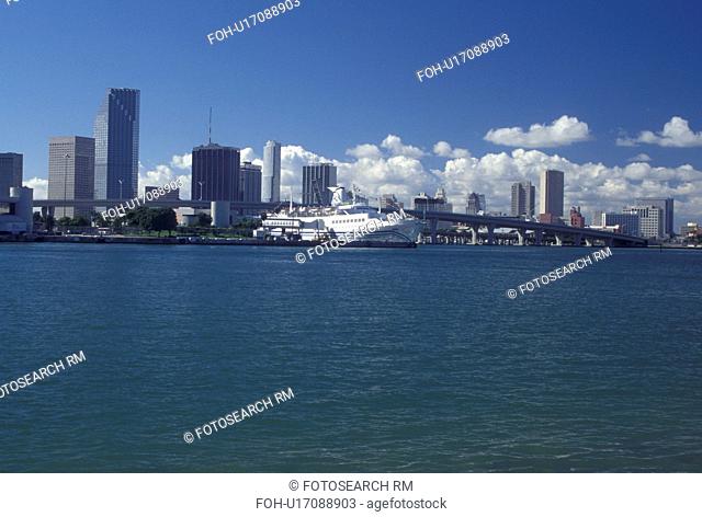 Miami, FL, Florida, Atlantic Ocean, Cruise ship docked at the Port of Miami Biscayne Bay with a view of the downtown skyline of Miami