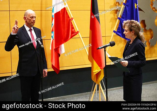 04 March 2020, Thuringia, Erfurt: Wolfgang Tiefensee (SPD), Thuringia's Minister of Economics and Deputy Prime Minister, is sworn in by Birgit Keller (Die...