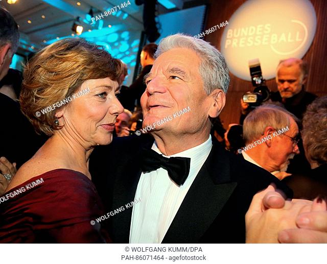 German president Joachim Gauck (front R) dances with his partner Daniela Schadt at the German Federal Press Ball at Hotel Adlon in Berlin, Germany