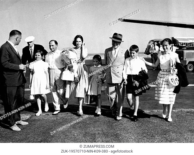 July 10, 1957 - Paris, France - British actor CHARLIE CHAPLIN with his wife OONA and children at the airport. Sir Charles Spencer Chaplin, Jr