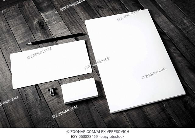 Photo of blank stationery on wood background. Corporate identity set. Branding mockup. Responsive design template