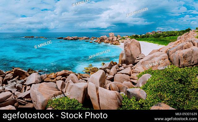 Tropical island landscape, the path for a secret beautiful beach, Anse Marron, La Digue, Seychelles
