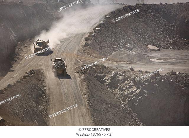Trucks driving in quarry