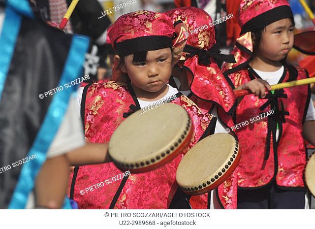 Itoman, Okinawa, Japan: children playing Eisa music during the O-tsunahiki Festival