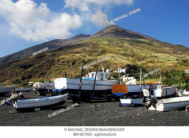 Fishing boats on a black sandy beach on Stromboli Island, Stromboli volcano, Aeolian or Lipari Islands, Sicily, South Italy, Italy, Europe