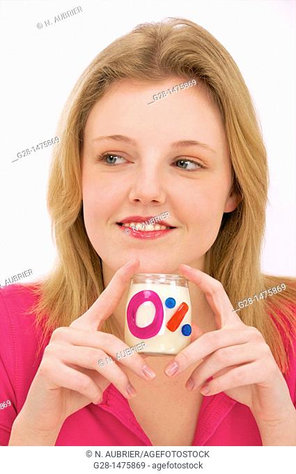 young woman with a zero fat milk yogurt