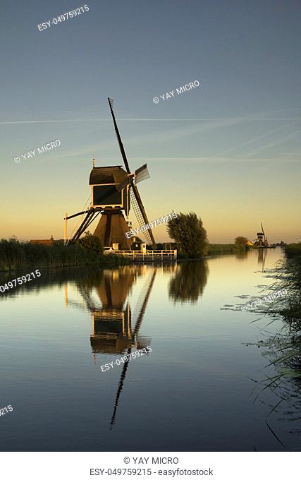 Windmill the Gelkenesmolen along the Ammersche Boezem canal near the Dutch village Groot-Ammers