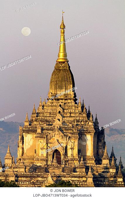 Myanmar, Mandalay, Bagan. Dawn and moonrise over the Gawdawpalin Temple in Bagan in Myanmar