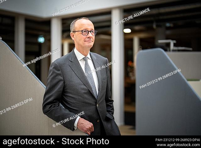 12 December 2023, Berlin: Friedrich Merz, CDU federal chairman and chairman of the CDU/CSU parliamentary group, after an interview with Deutsche Presse-Agentur...