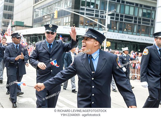 Dominican-American firefighters march in the 33rd Annual Dominican Day Parade in New York on Sixth Avenue