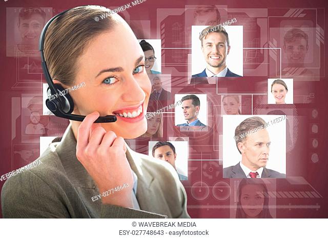 Composite image of smiling businesswoman with headset using computers