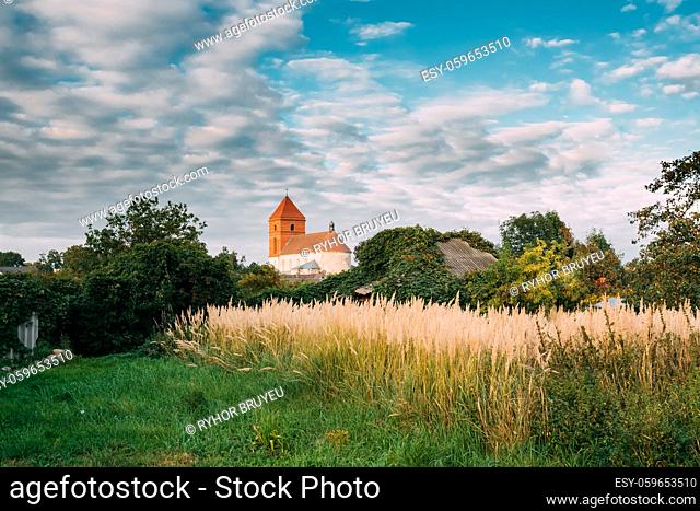 Mir, Belarus. Landscape Of Village Houses And Saint Nicolas Roman Catholic Church In Mir, Belarus. Famous Landmark