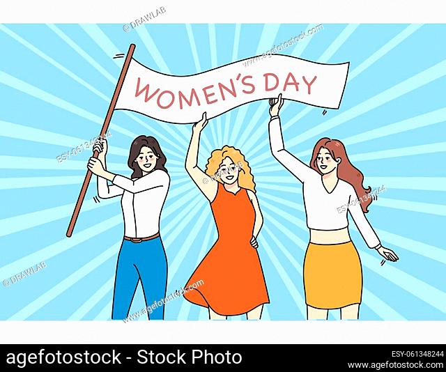 Smiling diverse women with banner for international woman day celebrate together. Happy female activists fight for feminist rights and equality