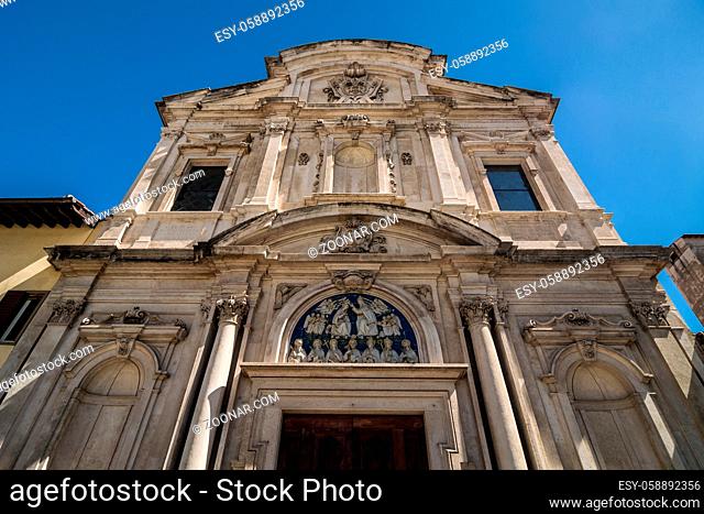 Facade of the Chiesa di Ognissanti (All-Saints Church) is a Franciscan church in Florence, Tuscany, Italy. Example of baroque architecture