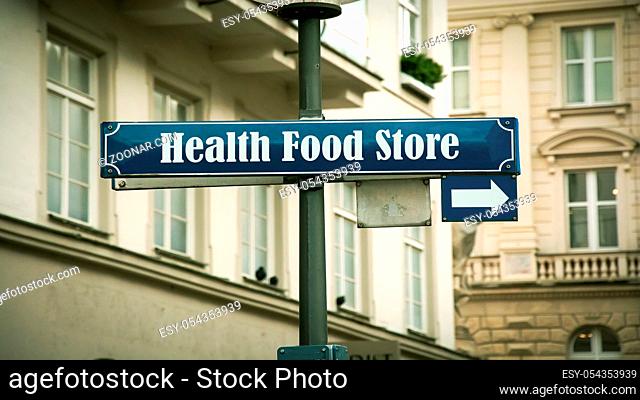 Street Sign the Direction Way to HEALTH FOOD STORE