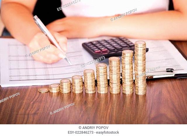 Woman Calculating Financial Work