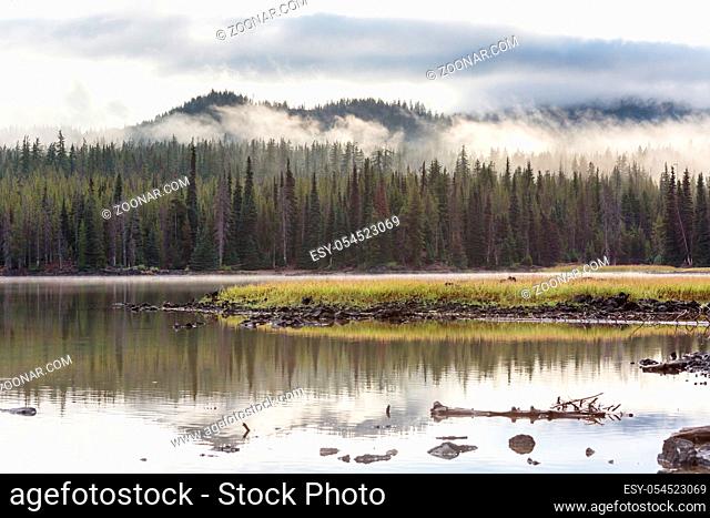 Serene beautiful lake in morning mountains, Oregon, USA