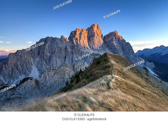 Autumnal sunset towards Mount Pelmo from the top of the Col de la Puina, Cadore, Dolomites, Veneto, Italy, Europe