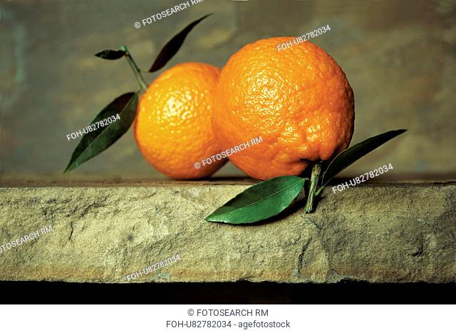 Fresh Oranges On Stone Background