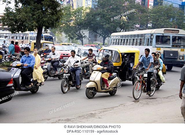 Traffic on road ; busy chaos M.G.Road ; Bangalore ; Karnataka ; India