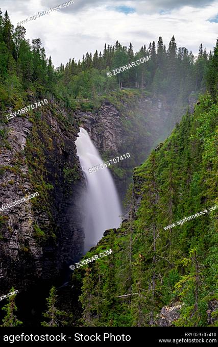 A vertical view of the Hallingsafallet waterfall in northern Sweden