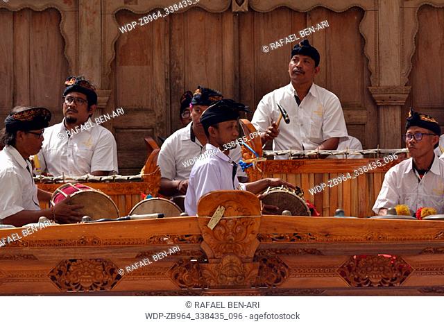 BALI - JULY 28 2019:Balinese gamelan orchestra playing traditional music. Gamelan is the traditional ensemble music of Java and Bali in Indonesia