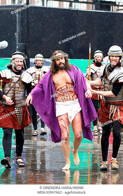 The members of Wintershall Estate re-enact the Passion of Jesus Christ inTrafalgar Square to mark Good Friday. The performance depicts the last hours in the...