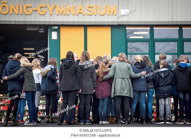 Students stand in front of the Joseph Koenig School before school starts in Haltern am See, Germany, 25 March 2015. 16 students and 2 teachers from this...