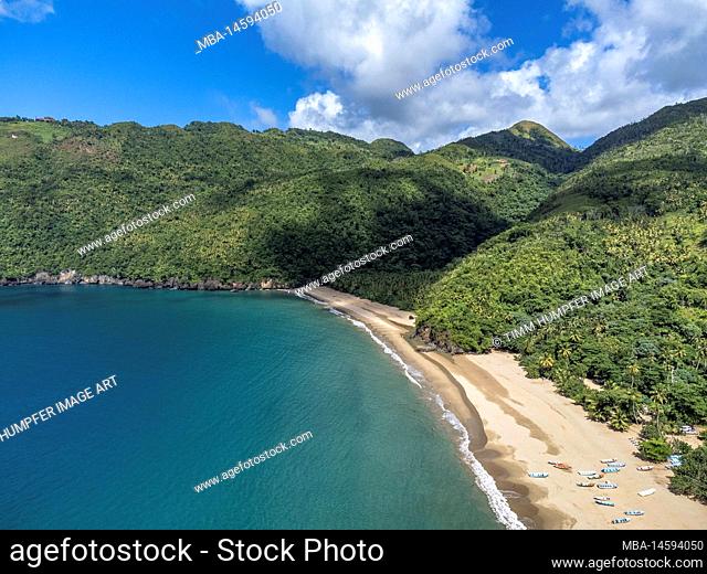 North America, Caribbean, Greater Antilles, Hispaniola Island, Dominican Republic, Sama, El Valle, Colorful wooden boats at Playa El Valle beach