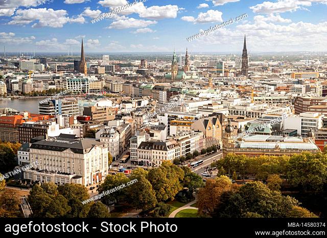 View over Hamburg city center with city hall, Alster and the many churches