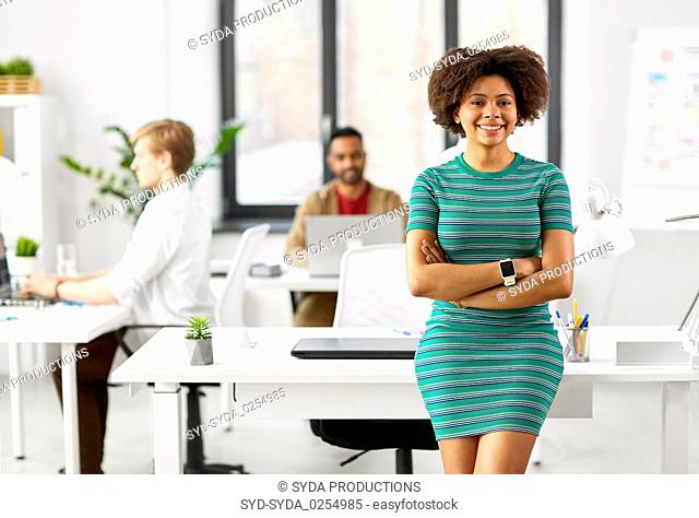 happy smiling african american woman at office
