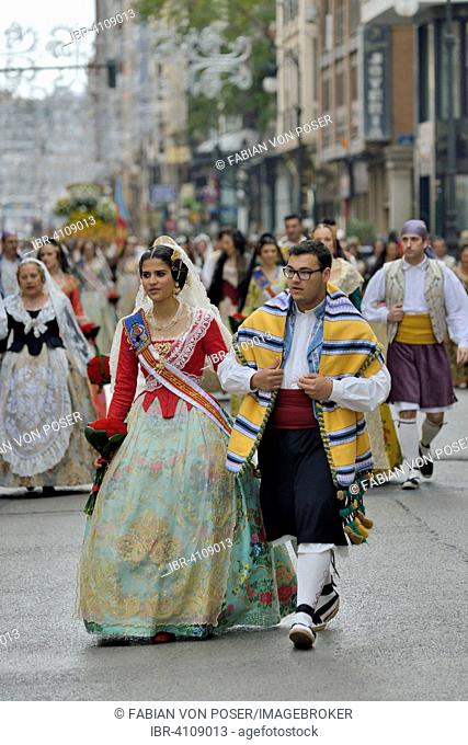 Fallas festival, parade, flower offering, at Plaza de la Virgen de los Desamparados, Valencia, Spain