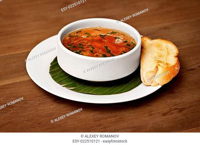 Seafood soup with toasted bread