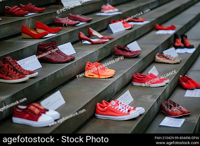 29 April 2021, Lower Saxony, Hanover: Red shoes stand in front of the Lower Saxony Parliament during the ""Red Shoes"" campaign against Turkey's withdrawal from...