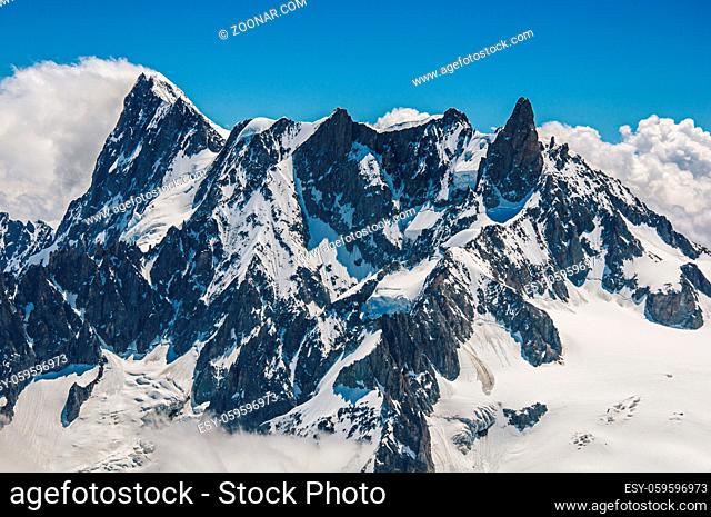 Close-up of snowy peaks and mountains, viewed from the Aiguille du Midi, near Chamonix. A famous ski resort located in Haute-Savoie Province