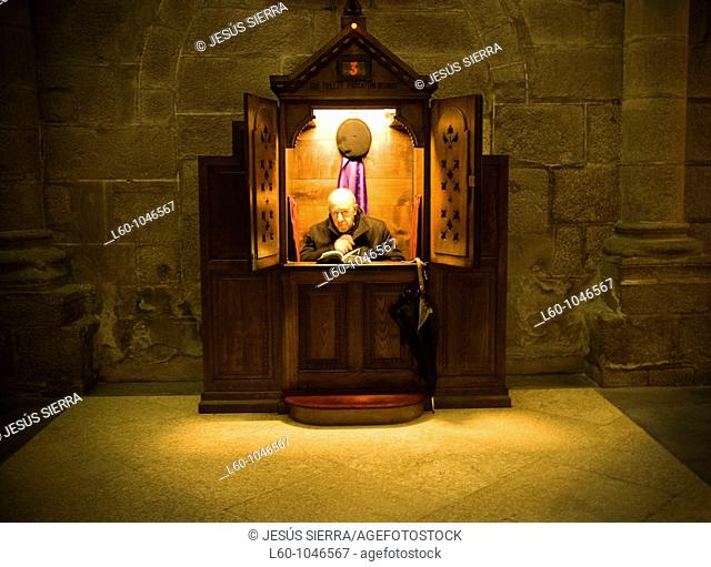 Priest in confessional  Cathedral Santiago, Santiago de Compostela, Galicia, Spain