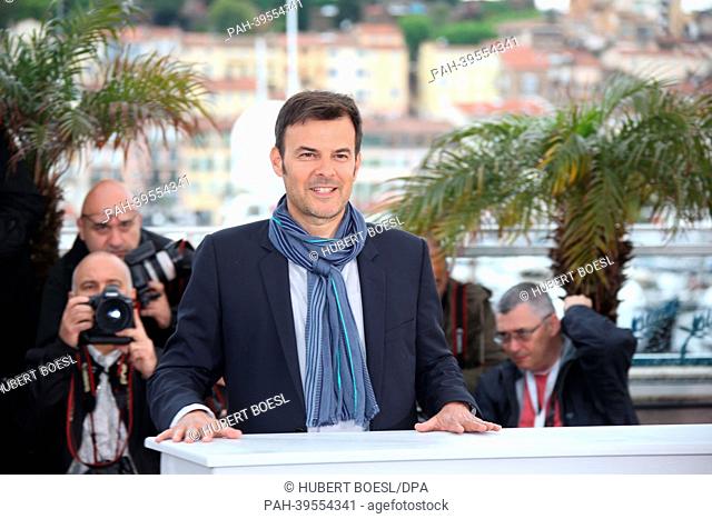 French director Francois Ozon poses during the photocall for 'Jeune & Jolie' (Young & Beautiful) at the 66th annual Cannes Film Festival in Cannes, France