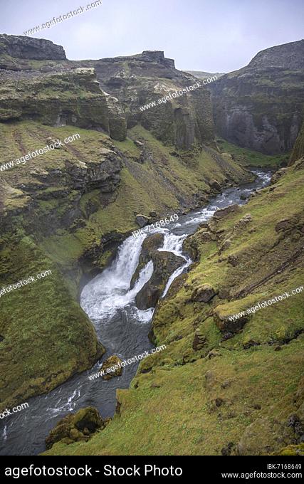Waterfall in a gorge, landscape at the Fimmvörðuháls hiking trail, South Iceland, Iceland, Europe