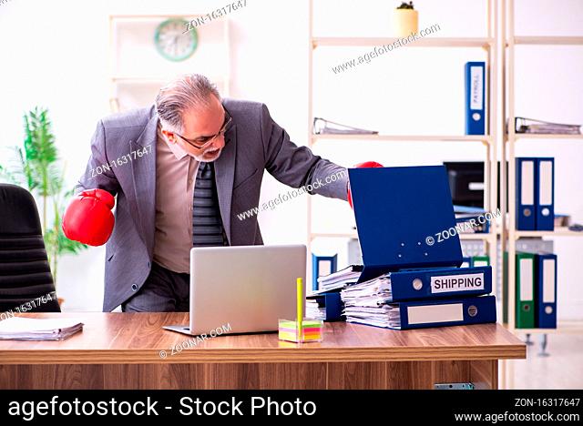 Businessman angry and furious at his workplace