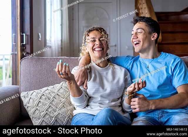 Portrait of grateful teenager man hug smiling middle-aged mother show love and care, thankful happy grown-up son in embrace cheerful mom