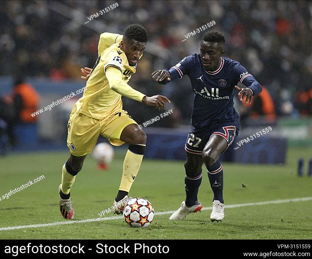 Club's Clinton Mata and PSG's Idrissa Gueye fight for the ball during a soccer game between French club Paris Saint-Germain and Belgian team Club Brugge KSV
